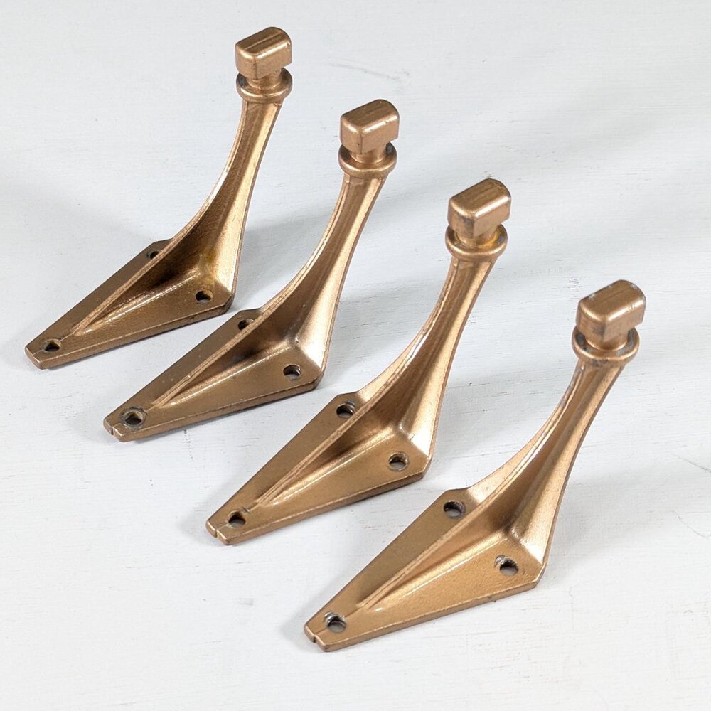 Vintage handrail brackets or modernist coat hooks in soft gold tone metal